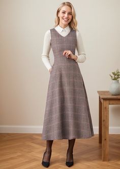 ★★FEATURES 25% wool, other fiber, nylon Two side pockets Back zipper closure Sleeveless dress Plaid dress Midi length Perfect for winter, autumn, spring Dry clean ★★ The model is 170 cm (5′ 7″) tall with a 80 cm (31.5") bust, 66 cm (26") waist. She is wearing in size XS. ★★Bespoke Order Service If you Request other color Request the length Your height is not between 155 cm- 175 cm Your weight is not between 47 kg -77 kg I can do it for you, It will need some extra fee depending on on your need. Contact with me for more detail. ★★ Warmly Note: 1 ) : Please confirm your shipping address! If you wish to ship the item to a different address, please send me a message immediately after purchase. We can't change it after shipping, thank you for your understanding. 2 ) : Due to individual monitor V-neck Winter Dresses With Pockets, V-neck Winter Dress With Pockets, Winter V-neck Dress With Pockets, Sleeveless Tweed Dress For Fall Workwear, Fall Sleeveless Tweed Work Dress, Sleeveless Tweed Dress For Work In Fall, Fitted Sleeveless Tweed Dress For Winter, Sleeveless Dresses With Pockets For Fall, Sleeveless Wool Dress For Fall