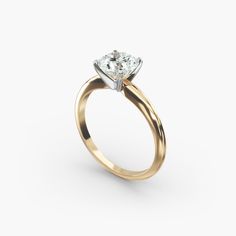 a yellow gold engagement ring with a single diamond in the center, on a white background