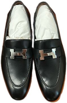 Silver Slip-on Business Loafers, Silver Slip-on Loafers For Business, Classic Silver Loafers For Formal Wear, Classic Silver Loafers For Formal Occasions, Classic Silver Loafers For Business, Luxury Silver Loafers For Business, Silver Loafers With Leather Sole For Business, Designer Silver Loafers With Leather Sole, Luxury Silver Loafers With Round Toe