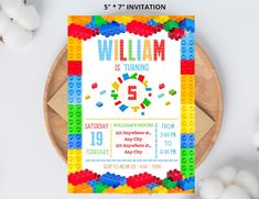 a lego birthday party is shown with the name and age on it's card