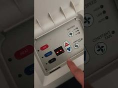 two pictures of a machine with buttons and symbols on the front, side by side