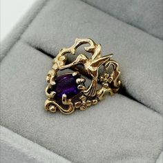 14k 14kt Yellow Gold Ring Of A Hummingbird Hovering Over An Oval Amethyst Surrounded By Flowers And Vines. Artisan And Vintage. Very Unique, Makes A Statement On The Hand. Weight: 4.6 Grams Size: 5.5 Stamped And Tested Condition: Pre Owned. Excellent Used Condition Item # 113 Magical Ring, Gold Hummingbird, Surrounded By Flowers, Dream Engagement, Dream Engagement Rings, Jewelry Lookbook, Wardrobe Style, Yellow Gold Ring, Amethyst Ring