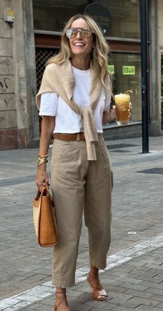 Khaki Pants Outfit For Work, Danish Street Style Summer, San Francisco Work Outfit, Styling A White Tshirt, Mediterranean Spring Outfits, Summer Beige Outfit, Tshirt Cardigan Outfit Ideas, Beige Capris Outfit, Mm Personal Styling