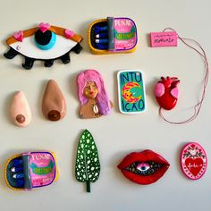 there are many different items on the table together, including lipstick and other things to make it look like they have eyes