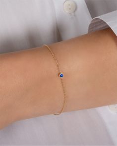 Beautifully handcrafted birthstone of your choice in a 14k yellow gold small bezel cup laying on a dainty cable link chain bracelet. Uber chic and timeless bracelet, perfect by itself or stacked. Stone Carat Weight: Approx. 0.10 ctw Total Weight: Approx. 2 grams Available Birthstones: Garnet, Amethyst, Aquamarine, Diamond, Emerald, Alexandrite, Ruby, Peridot, Sapphire, Rose Zircon, Topaz, Blue Zircon Standard Production: 5-8 business days Rush Order Production: 3-5 business days Shipping: Select Dainty 14k Gold Birthstone Chain Bracelet, 14k Gold Chain Bracelet With Bezel Setting As Gift, 14k Gold Chain Bracelet With Bezel Setting, Dainty Yellow Gold Chain Bracelet With Birthstone, Dainty Chain Bracelet With Bezel Setting As Gift, Dainty 14k Gold Birthstone Bracelets, 14k Gold Dainty Bezel Set Bracelet, Dainty 14k Gold Gemstone Chain Bracelet, Timeless Bracelet