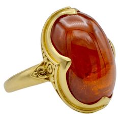 This deep orange tourmaline cabochon Steven Battelle Designed ring is approximately 9.80 ct. and glows from within. The granular 18k gold setting beautifully frames the oval stone. The ring size is 7 1/8 and can be sized to fit your finger. Medieval Rings, Blue Star Sapphire, Rubellite Tourmaline, Deep Orange, Tanzanite Ring, Diamond Cocktail Rings, Modern Ring, Enamel Ring, Domed Ring