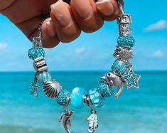 Crustaceancore Charm, Ocean Charm - Etsy Beach Ocean-inspired Charm Bracelet, Silver Starfish Charm Bracelet For Beach, Blue Charm Bracelets For The Beach, Silver Charm Bracelet With Starfish For Beach, Ocean-inspired Starfish Charm Bracelet For Beach, Ocean-inspired Blue Charm Bracelet For Beach, Bohemian Charm Bracelet For Beach With Lobster Clasp, Handmade Silver Charm Bracelet For Beach, Silver Charm Bracelet With Lobster Clasp For Beach