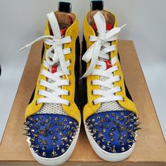 Reposhing This Item I Purchased From @Designerlux707. Loved It, But Ready To Rotate For Something New. Questions? Leave A Comment Below! Shoes Louboutin, Louboutin Shoes, Christian Louboutin Shoes, Mens Shoes Sneakers, Yellow Blue, High Top, Something New, Blue Yellow, High Tops