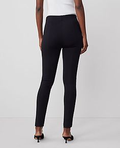 Sleek and stretchy in faux leather and ponte, our side zip leggings are endlessly flattering - and extra versatile. Elasticized waist. Hidden side zip with hook-and-eye closure.,Leg Shape:Skinny – a fitted favorite with shaping stretch and polished details,Rise:High rise: sits 1/2" to 1" below natural waist,Imported:Imported,Fit:Tailored & fitted,Length:Full length: 28 1/2" inseam with 10" leg opening,Fabrication:Front Panel: Imitation Leather Coating: Polyurethane Back: 100% Polyester; Back pan Black Stretch Leggings With Zipper Closure, Stretch Leggings With Zipper Closure For Fall, Stretch Fall Leggings With Zipper Closure, Sleek Stretch Bottoms With Zipper Closure, Tight Leggings With Zipper Closure, Chic Black Leggings With Zipper Closure, Chic Workwear Leggings With Zipper Closure, Chic Black Leggings With Minimal Stretch, Chic Stretch Leggings With Zipper Closure