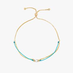 Delicate, dual detail in one seamless piece. The Dainty String & Chain Slider Bracelet adds both a pop of vibrant color and a glimmer of gold while meeting at a baguette center stone with a polished finish. Slider Bracelet, Accessories Bracelets, Sliders, Bangle Bracelets, Bangles, Vibrant Colors, Fashion Accessories, Couture, Bracelet