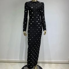 This black maxi dress features long sleeves and a bodycon fit, adorned with sequined dots. The elegant design is perfect for formal events and occasions, adding a touch of shimmer and style. Stay comfortable and chic with this glamorous addition to your wardrobe. Fabric: Medium Stretch Material: Polyester, Elastane Black Maxi, Long Sleeve Maxi, Black Xs, Fabric Medium, Black Maxi Dress, Long Sleeve Maxi Dress, Formal Event, Elegant Design, Dots