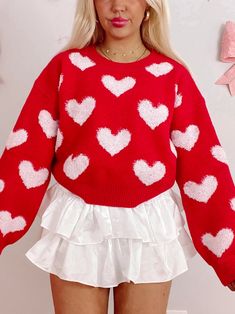 Heartfelt Red Heart Sweater | sassyshortcake.com | Sassy Shortcake White Heart Sweater For Winter, White Heart Print Sweater For Winter, Winter Heart Graphic Sweater, Winter Sweater With Heart Graphic, White Long Sleeve Sweater For Valentine's Day, White Sweater For Valentine's Day, Cute Winter Sweater With Heart Graphic, Cute Heart Graphic Sweater For Winter, Red Long Sleeve Sweater With Heart Print