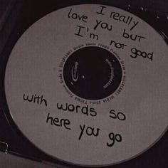 a cd with words written on it in black and white ink that says, i love you but i'm not god