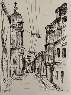 a black and white drawing of a street with buildings on both sides, an old church steeple in the background