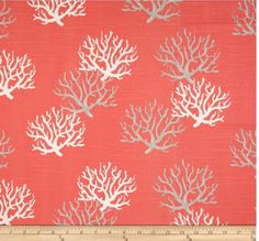 an orange and white coral print fabric with small grey corals on the bottom half of it