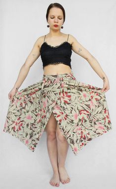 "Lovely handmade vintage wrap skirt; there are no holes for the belt as you would expect from wrap skirt that has been made nowadays. In perfect vintage condition, will be great for summer, festivals or beach. The best will fit for S -M sizes. Measurements: Waist (full width): 35\" (89 cm) Hips: free Length: 29\" (73 cm) Model in the photos is size S More from Vintage Finds: https://www.etsy.com/shop/somethingmustbehere We also make linen, knit and crochet items: https://www.etsy.com/shop/ActLikeACharm" Floral Print Flowy Asymmetrical Wrap Skirt, Asymmetrical Floral Print Flowy Wrap Skirt, Flowy Asymmetrical Wrap Skirt With Floral Print, Cotton Wrap Skirt For The Beach, Relaxed Cotton Wrap Skirt For The Beach, Summer Midi Wrap Skirt, Long Cotton Wrap Skirt For Beach, Floral Print Wrap Skirt For Vacation, Cotton Long Wrap Skirt For Beach