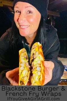 a woman holding up a sandwich in front of her face with the caption blackstone burger & french fry wraps