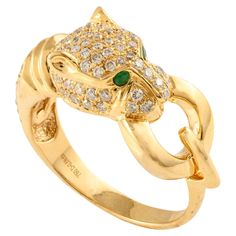 Diamond Studded Panther Head Ring Crafted in 18K Gold featuring natural emerald of 0.03 carats and diamonds of 0.5 carats. The gorgeous handcrafted ring goes with every style. Emerald enhances intellectual capacity of the person. Designed with a panther head studded with diamonds and emerald studded in the eye holding a gold ring from its mouth making a cocktail ring that makes it a perfect fit to wear it on your occasion or style it with any of your basic outfit to give it a glam. This is a per Panther Head, Gemstone Solitaire Ring, Ring With Emerald, Sapphire Solitaire Ring, Mother Daughter Gifts, White Gold Solitaire, Head Ring, Gold Solitaire Ring, Sapphire Solitaire