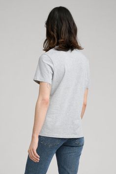 Cemented as the #1 womens’ essential by Jane Birkin in the 60's and 70's, The T-Shirt is the natural starting place for our growing permanent collection of women's essentials. Developed for longevity, both aesthetically and physically, our T-Shirt is made from a soft yet substantial mid-weight organic cotton jersey, designed to feel light without being frail or see-through. It's cut to a classic fit and accentuated with a slightly elevated, neatly ribbed neckline. Tuck it into a skirt, or make i Gray Short Sleeve T-shirt For Everyday, Heather Grey Cotton Short Sleeve T-shirt, Heather Grey Cotton Tri-blend T-shirt, Heather Grey Tri-blend Cotton T-shirt, Gray Tri-blend Cotton T-shirt, Simple Organic Cotton Short Sleeve T-shirt, Everyday Cotton Jersey Short Sleeve Tops, Classic Short Sleeve T-shirt In Organic Cotton, Classic Short Sleeve Organic Cotton T-shirt