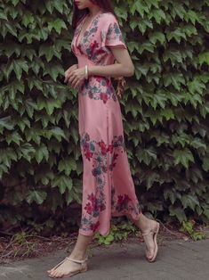 Maxi length V neck dress with short sleeve and pink floral print. Silky satin like material feel. Model is in MINUSEY S. * MINUSEY S = EU 34, US 2* MINUSEY M = EU 36, US 4* 100% Polyester* Dry clean* Made in Korea - Model Height: 170cm/5'7" (US2, EU34) Spring Satin Maxi Dress With Short Sleeves, Pink Printed V-neck Midi Dress, Knee-length Satin Dress With Floral Print, Spring Satin Midi Dress With Short Sleeves, Spring Short Sleeve Satin Midi Dress, Pink Satin Short Sleeve Dress, Pink Satin Dress With Short Sleeves, Summer Short Sleeve Satin Dress, Short Sleeve Satin Dresses For Summer