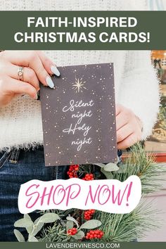 a woman holding up a christmas card with the words, shop now