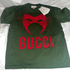 Brand New Shirt Men’s But I Wear A Large In Women’s And Was Going To Wear It Was A Dress/With Shorts. It Runs Bigger. Designer Green Cotton Tops, Gucci Hoodie, Dress With Shorts, Gucci Shirt, Gucci Top, Gucci T Shirt, Jacquard Blouse, Black Halter Top, Black Sleeveless Blouse