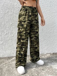 Embrace the urban jungle with our Camo Print Flap Pocket Cargo Pants. Featuring a trendy camouflage pattern, these pants offer a perfect blend of style and functionality. The flap pockets provide ample storage space, while the comfortable fit and durable fabric ensure long-lasting wear. Whether you're exploring the outdoors or simply want to make a fashion statement, these cargo pants are a must-have for the modern adventurer. Details: Type: Cargo Pants Closure Type: Drawstring Waist Details: Dr Military Cargo Pants With Elastic Waistband, Military Cargo Pants With Elastic Waistband For Streetwear, Casual Camouflage Pants With Hip Pockets, Camouflage Full Length Utility Pants, Urban Camouflage Parachute Pants With Pockets, Camouflage Full-length Utility Pants, Full Length Camouflage Utility Pants, Camouflage Wide Leg Pants With Multiple Pockets, Casual Camouflage Cargo Pants With Side Pockets