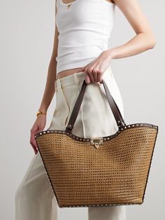 Those in the know will instantly recognize this tote as a Valentino Garavani design by the gold-tone 'Rockstud' embellishments. It's been made in Italy from raffia in a softly structured shape that's outlined with contrasting leather and has a flip lock at the open top. Stow everything you need, including an iPad, planner, water bottle and sunglasses case inside. Vacation Outfit Ideas, Valentino Garavani Bag, Ipad Planner, Vacation Outfit, Raffia Bag, Valentino Rockstud, Crochet Bags, Pump Sandals, Open Top