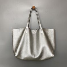 Overview: Design: Fashion Womens Silver Leather Oversize Tote Bag Black Shoulder Tote Bag Handbag Tote For WomenIn Stock: Made to order (2-3 days)Include: Tote + A detachable Side InnerCustom: NoColor: Silver, BlackLeather: CowhideMeasures: Horizontal Style S: 46cm/Bottom 34cm x 30cm x 14cmHorizontal Style L: 50cm/Bottom 37cm x 33cm x 16cm Vertical Style S: 41cm/Bottom 33cm x 35cm x 11cm Vertical Style L: 47cm/Bottom 37cm x 40cm x 11cmWeight: 0.75 kgSlots: 1 slotAccessories(option): NoStyle: Fas Handmade Leather Tote Bag, Overview Design, Oversized Tote Bag, Oversized Tote, Felting Tutorials, Tote Bag Black, Tote Bag Leather, Shoulder Tote Bag, Black Tote Bag