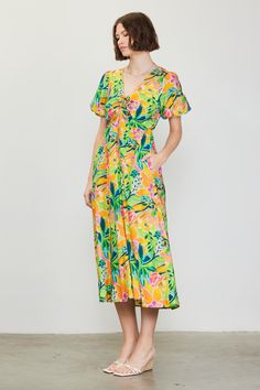 A color palette of mood-boosting brights enlivens this floral-printed midi dress. Framed by voluminous bubble sleeves, it's got a V-shaped neckline with tie detailing that lets you adjust the fit of the bodice. •V-shaped neckline •Adjustable tie detailing •Short bubble sleeves •Elasticized back waist •Mid-length hem Item Number: 99794 Vacation Dresses Casual, Wedding Guest Dress Trends, Cinched Top, Short Dress White, Puff Sleeve Midi Dress, Athleisure Dress, Matching Sets Outfit, Baby Shower Dresses, Casual Wedding Dress