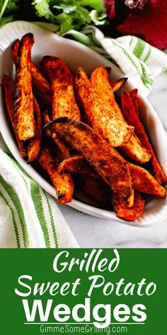 grilled sweet potato wedges in a white bowl on a green and white towel