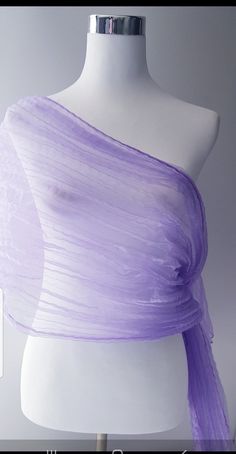 Purple Shawl in organza silk material with a shimmery shine. To achieve the crinkled / crushed look the shawl is twisted whilst wet and tied with a rope and left to dry. Beautiful shawl, will make any outfit look glamorous.  Keep it or gift it.  Care Instructions Hand wash mild detergent Hang to dry naturally  Crush will remain as long as you don't iron. If you want to remove the crush affect on shawl just iron with cloth on top.  Plz note, once ironed the crush affect will not return. Thank you Purple Shawl, The Crush, Purple Scarf, Purple Wrap, Bridal Shawl, Purple Scarves, Wedding Wraps, Silk Material, Purple Wedding