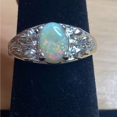 Beautiful Australian Opal From Coober Pedy Ring Set In Sterling Silver . Crystal Opal With Red , Green , Yellow, And Faint Blue . Smaller Stone , Not As Bright In Color . Fun Ring To Wear . Australian Opals Are The Most Sought After . Size 7 , Stone Is Aprox .60 Maybe A Bit Bigger , We Did Not Cut This One Dainty Diamond Band, Emerald Cut Eternity Band, Coober Pedy, Crystal Opal, Luxury Rings, Red Green Yellow, Rings Cool, Fashion Board, Diamond Rings Bands