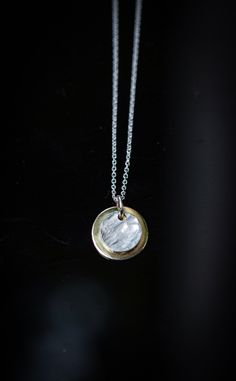 "Reticulated silver and gold-filled discs make up this eclipse pendant that is a great everyday wear. Small and light, the pendant won't weigh you down. Largest disc is 1/2\". Sterling silver chain measures 18 inches long. Ready to ship. PLEASE USE A POLISHING CLOTH TO CLEAN UP ANY TARNISH THAT WILL NATURALLY HAPPEN. We offer polishing/refurbishing. Here's the listing: https://www.etsy.com/listing/960628506/jewelry-repairs-clean-and-polishing?ref=shop_home_active_43&frs=1" Silver Circle Brass Necklaces, Moon Phase Coin Necklace With Round Pendant, Silver Brass Round Disc Necklace, Everyday Silver Coin Necklace, Everyday Silver Round Disc Coin Necklace, Silver Round Disc Coin Necklace For Everyday, Eclipse Necklace, Silver Wings, Midi Rings