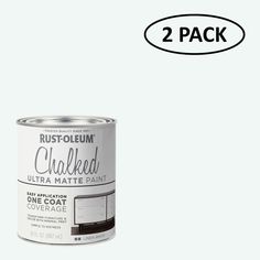 two cans of rust - colored chalked ultra matte paint