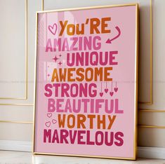 a pink poster with the words you're amazing, unique, awesome and strong