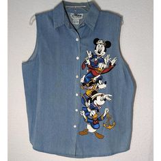 a blue jean shirt with mickey mouse on it