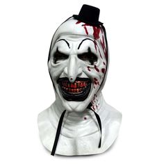 a white mask with blood all over it's face and mouth, on a white background