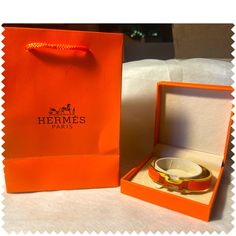 Giftable Item. Beautiful New Piece Without The High Price Luxury Rectangular Bracelet Gift, Luxury Rectangular Bracelet As Gift, Designer Rectangular Bracelets As Gift, Orange Rectangular Jewelry As Gift, Elegant Orange Bracelet For Gift, Formal Orange Rectangular Jewelry, Hermes Orange, Hermes Jewelry, Wrist Bracelet