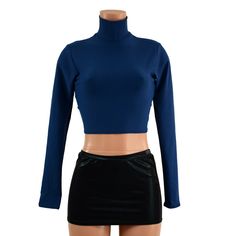 "This Poseidon Blue Zen top features a turtleneck, cropped hemline, and long sleeves. Four way stretch for a comfy fit. This item is made to order. Ships out within 5 days of purchase. Womens Sizing (See below for instructions on where measurements should be taken) XXS: Bust 29\"-30\" / Waist 22\"-23\" / Hips 30\"-32\" Extra Small: Bust 31\"-32\" / Waist 24\"-25\" / Hips 33\"-35\" Small: Bust 33\"-34\" / Waist 26\"-28\" / Hips 36\"-37\" Medium: Bust 35\"-37\" /Waist 28\"-31\" / Hips 38\"-40\" La Blue Cropped Elastane Crop Top, Fitted Solid Color Crop Top For Fall, Fitted Cropped Long Sleeve Top For Winter, Blue Cropped Elastane Top, Long Sleeve Stretch Crop Top In Solid Color, Long Sleeve Stretch Solid Color Crop Top, Stretch Turtleneck Crop Top For Winter, Winter Stretch Turtleneck Crop Top, Fitted Long Sleeve Top In Solid Color