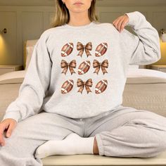 New! Football Bow Pattern Sweatshirt, Coquette Football Sweater was just added to eBay. Check it out! #eBay #eBaySeller Varsity Sweatshirt For Cheerleading In Fall, Casual Fall Cheerleading Sweatshirt, Coquette Sweater, Football Sweater, Design Sweatshirt, Funny Hats, Football Sweatshirt, Bow Pattern, Fashion Unique