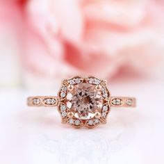 Checkout our New Arrival http://etsy.me/1NHhwAl The center stone is natural 7mm Round Fancy Color AAA Pink morganite. The side stones are Natural diamond in G-H/SI Color/Clarity. The setting is a solid 14k Rose gold and authenticated with a 14k stamp. It has a dazzling high polished finish to make its shininess last longer . You can make it a complete set with a matching band. This ring is absolutely stunning and I am confident you will love it. Perfect for Weddings, Mothers Day, Birthdays, Vale Heirloom Rose Gold Morganite Jewelry, Heirloom Morganite Rose Gold Jewelry, Blush Morganite Jewelry With Center Stone, Blush Morganite Center Stone Jewelry, Rose Gold Morganite Jewelry With Center Stone, Morganite Rose Gold Jewelry With Center Stone, Morganite Center Stone Rose Gold Jewelry, Rose Gold Morganite Round Wedding Ring, Morganite Round Jewelry With Halo Design