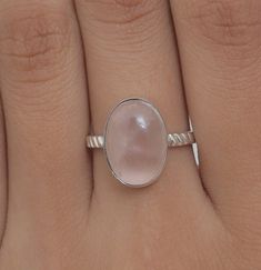 Rose Quartz Ring, 925 Sterling Silver Ring, Handmade Ring, January Birthstone Ring, Crystal Jewelry, Cabochon Ring, Wedding Gift For Women  Gemstone Name - Rose Quartz  Stone Quality - AAA Ring Weight - 6.30  gm Ring Length - 2 cm Ring Width -  1.5  cm Stone Shape - As shown in the picture Ring Size - All Ring Size Available    * You Will Get The Same Product As Shown In The Picture. We serve complete 925 sterling silver Jewelry and genuine properties of the stone. The products are dispatched from the small business from USA. Product Quality and Packaging - Our all products are 925 Silver Stamped which shows that the product is genuine and authentic .The products are dispatched from the small business from USA so you get the product on time and the product packaging comes in bubble foil wr Sterling Silver Cabochon Wedding Rings, Oval Natural Stones Wedding Ring, Rose Quartz Anniversary Rings, Oval Natural Stone Wedding Ring, Oval Natural Stone Rings For Weddings, Rose Quartz Round Rings For Anniversary, Oval Crystal Ring With Natural Stones For Wedding, Round Rose Quartz Rings For Anniversary, Wedding Sterling Silver Crystal Ring With Natural Stones