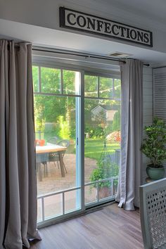 an open patio door leading to the back yard