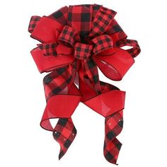 a red and black plaid bow on a white background