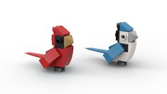 two lego birds sitting next to each other