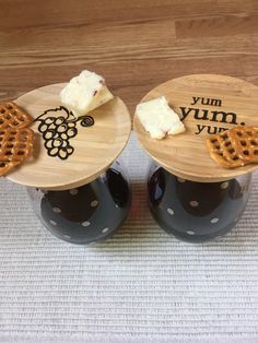 two wooden plates with waffles and cheese on them