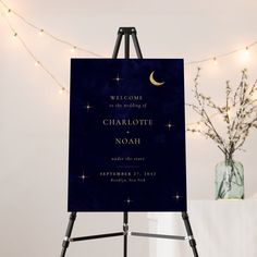 an easel with a sign on it that says welcome to the marriage of charlotte and noah