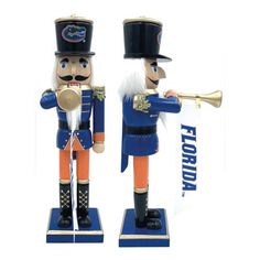 two blue and orange nutcrackers are standing next to each other with the word florida on it