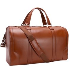 An elegant duffle perfect for a weekend business trip or exotic getaway. Its smooth design and smart style will have you feeling like you’re in command of the skies! Designed to be carried in hand or as a crossbody for ultimate comfort and mobility. Features: Top Grain Cowhide Leather 20.5" x 9" x 12" and 4 lbs. Business organizer Interior slip pocket Tablet pocket Locking double zipper closings Detachable shoulder strap Back zipper pocket Style #8819 Designer Business Travel Bag With Large Capacity, Luxury Travel Shoulder Bag, Luxury Luggage With Detachable Strap, Elegant Brown Weekender Bag For On-the-go, Designer Brown Travel Bag For Business Trips, Luxury Business Travel Bag With Detachable Strap, Designer Travel Bag With Luggage Sleeve, Luxury Travel Bag With Detachable Strap For Business Trips, Elegant Weekender Bag With Luggage Sleeve For Business Trips